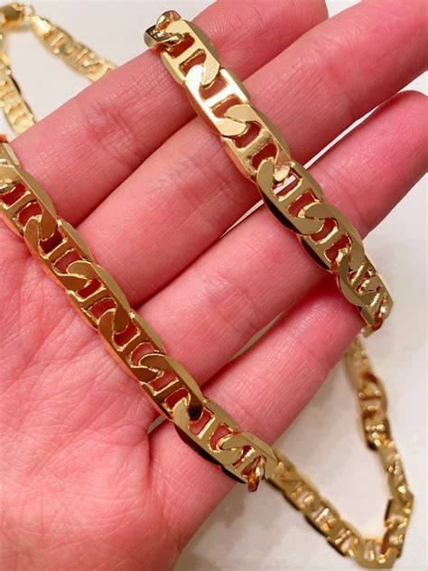 gold gucci ring men|Gucci chains for men.